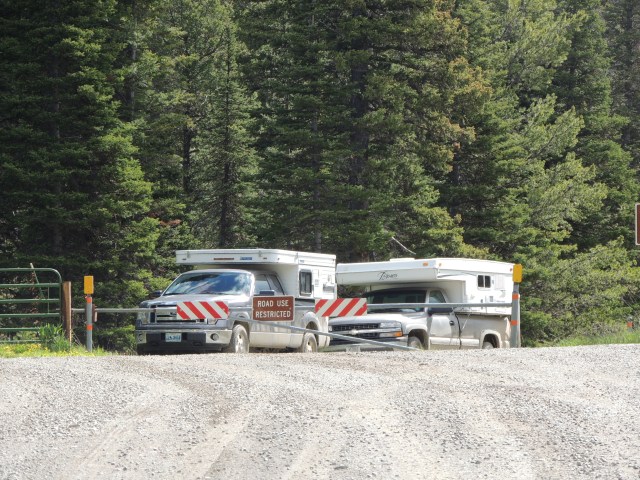 Our camper, and that of our new friend Tom, on the wrong side of a locked gate that was definitely OPEN when we came in.  